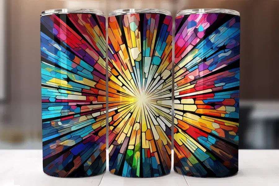 Three Colorful Tumblers Featuring A Stained-Glass Style Radiating Design.