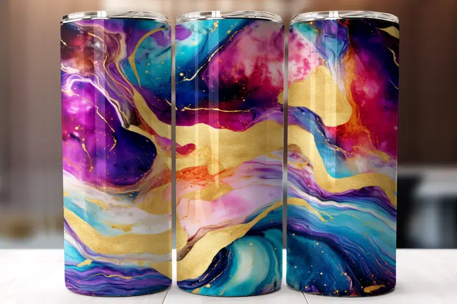 Three Colorful Tumblers With An Abstract Design Featuring Swirling Shades Of Purple, Pink, Blue, And Teal, Accented With Gold.