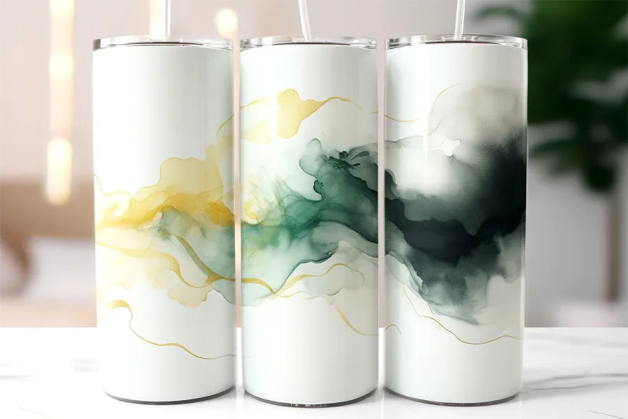 Three White Tumblers With Abstract Green And Gold Designs.