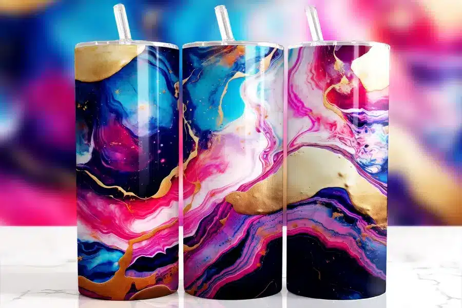 Gold pink blue swirl tumbler wrap featuring abstract fluid art with rich navy, hot pink, electric blue, and marbled gold accents in a high-contrast moody ink style, shown on a 20oz skinny tumbler mockup.