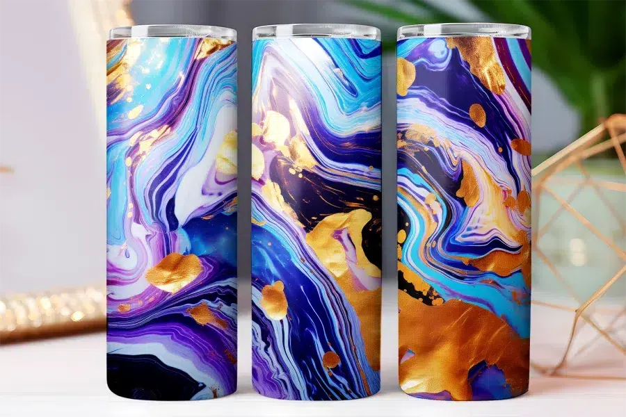 Three tumblers with a purple, blue, and gold marbled design.