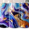Three Stainless Steel Tumblers With A Blue, Purple, And Gold Marble Design.