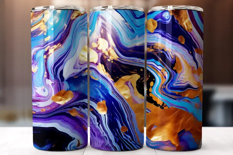 Three Tumblers With A Purple, Blue, And Gold Marbled Design.