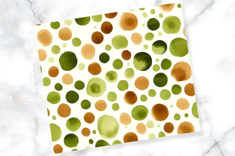 Watercolor-Style Pattern Of Various Sized Circles In Shades Of Green And Brown On A White Background.