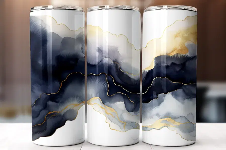 A Group Of Tall Cans With A Gold And Black Design
