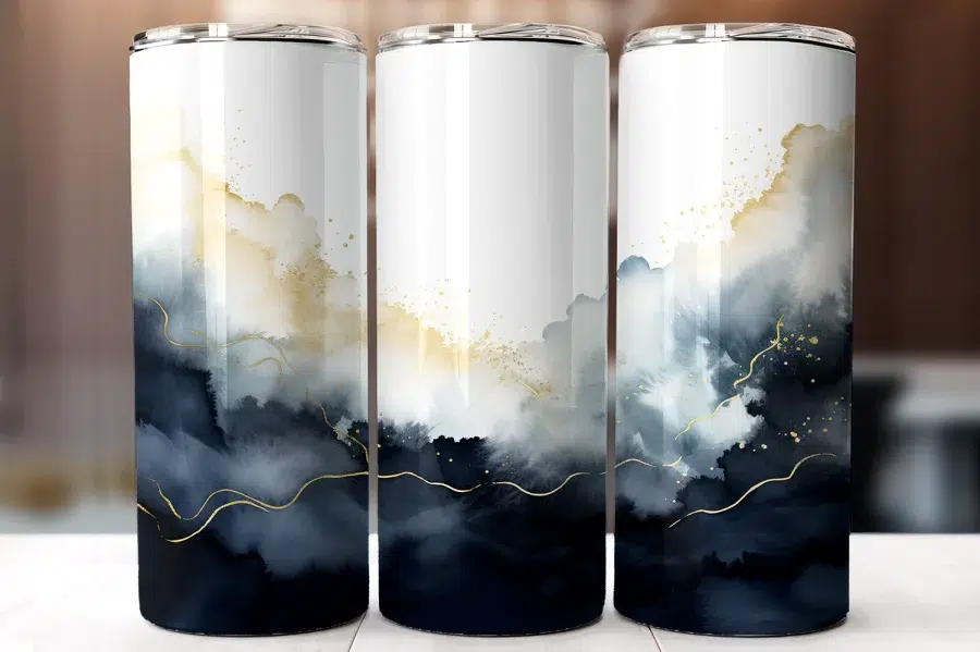 Three Tall Tumblers With An Abstract Design Featuring Shades Of Blue, White, And Gold.