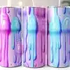 Three Pastel-Colored Tumblers With Dripping Paint Designs.