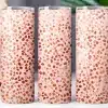 Three Pink And Terracotta Tumblers With A Speckled Pattern.