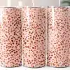 Three Pink And Terracotta Patterned Tumblers With Straws.