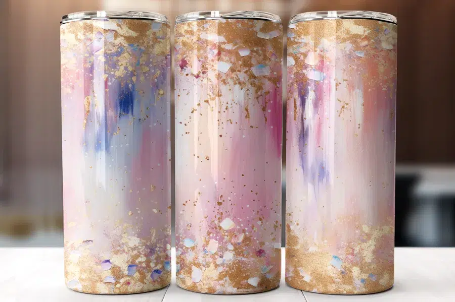 Three Tall Tumblers With An Abstract Design Of Pink, Purple, And Gold Paint Splatters.