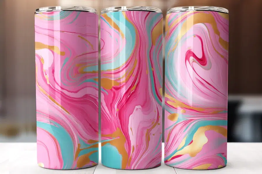 Three Pink, Teal, And Gold Marble Patterned Tumblers.