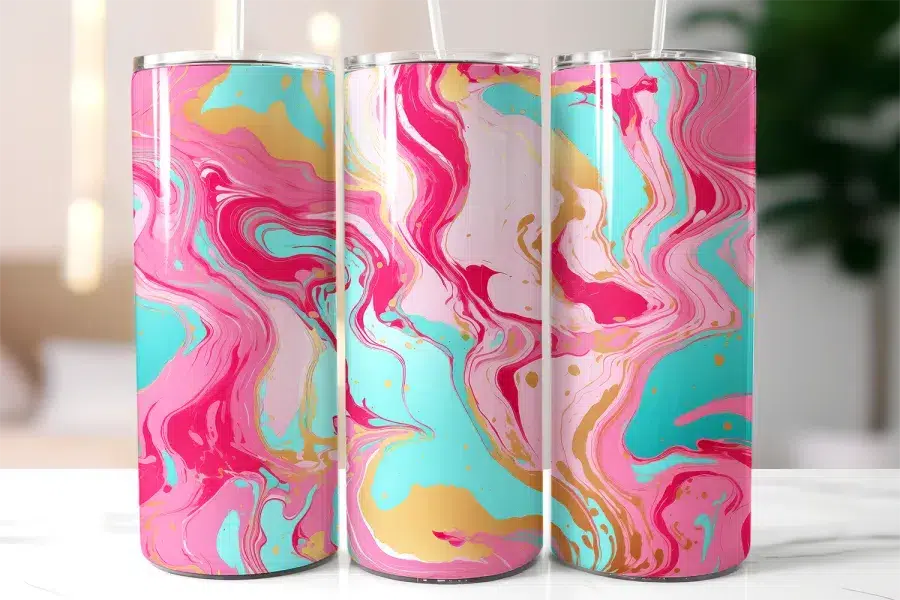 Three Tall Tumblers With Pink, Teal, And Gold Marble Designs.