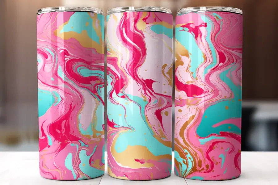 Three Pink, Teal, And Gold Marble Patterned Tumblers.