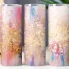Three Tall Tumblers With An Abstract Design Featuring Pink, Gold, And Blue Splatter Paint.