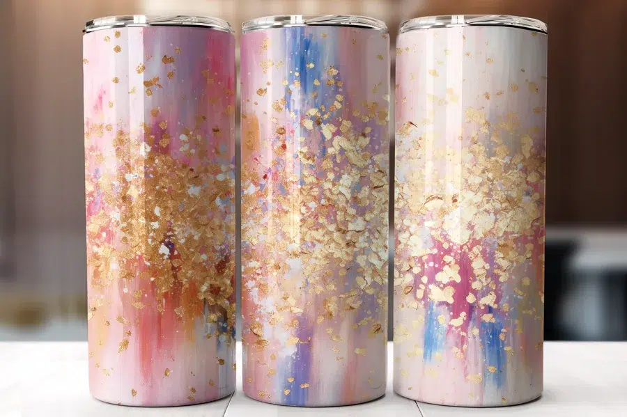 Three Pink And Gold Patterned Tumblers.