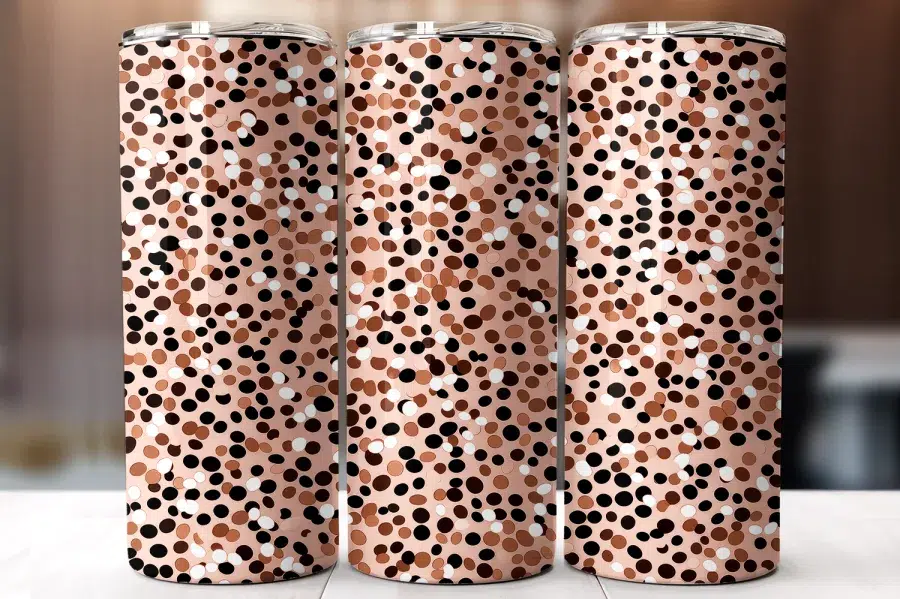 Three Tumblers With A Pink Background And A Pattern Of Brown, Black, And White Polka Dots.