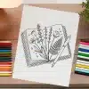 Line Drawing Of An Open Book With Flowers And A Fern Inside, And A Pen Resting On Top.