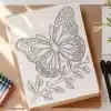 Line Drawing Of A Butterfly With Floral Details On Its Wings, Perched On A Stem With Leaves.