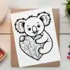 Line Drawing Of A Koala Hugging A Heart-Shaped Design.