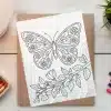 Line Art Coloring Page Featuring A Large Butterfly With Floral Details And A Small Branch With Leaves.