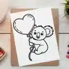 Line Drawing Of A Koala Holding A Heart-Shaped Balloon.