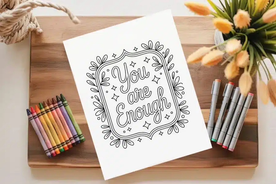 A Drawing On A Paper Next To Crayons