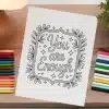A Paper With A Quote On It Next To Colored Pencils