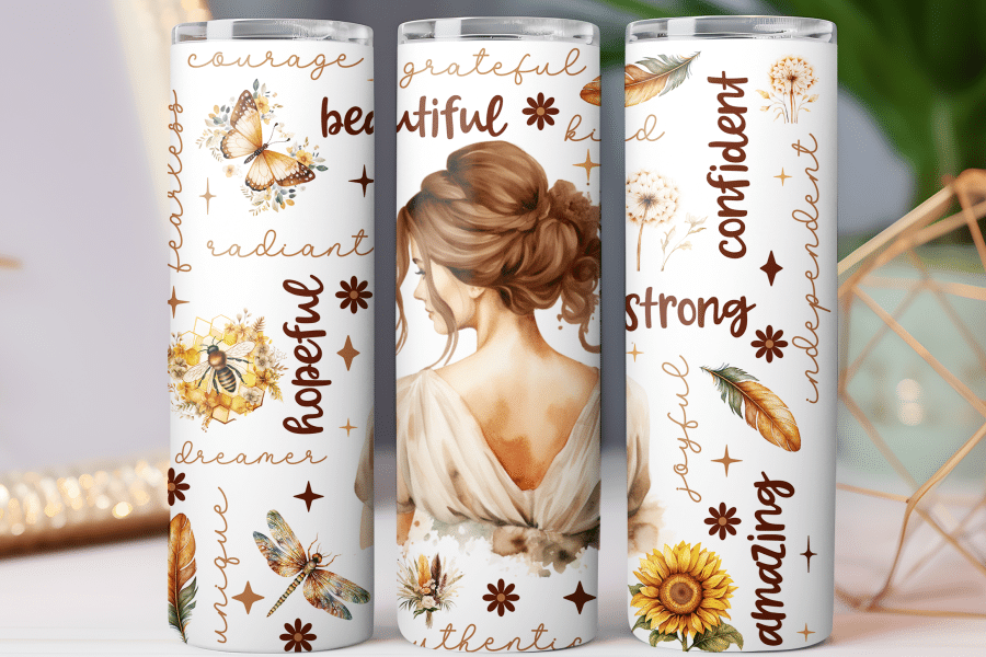 White tumbler featuring a watercolor illustration of a woman's back, surrounded by positive words and nature-inspired designs.
