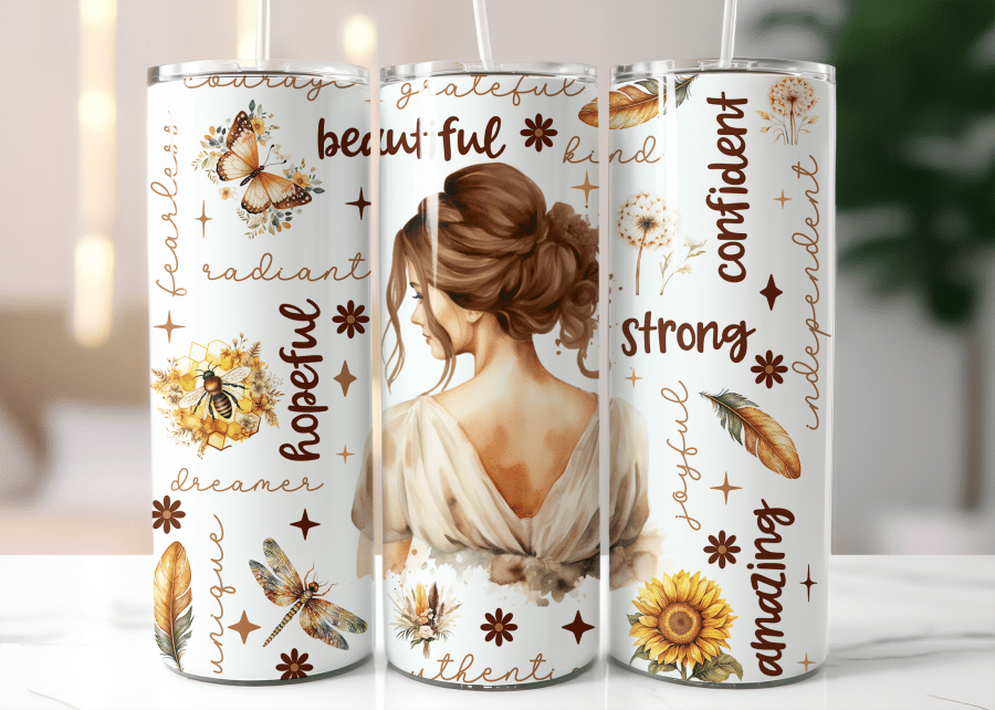 Three White Tumblers With Brown Text And Illustrations Of A Woman, Flowers, Insects, And Feathers.