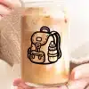 Hands Holding A Glass Of Iced Coffee With A Backpack And Water Bottle Design.