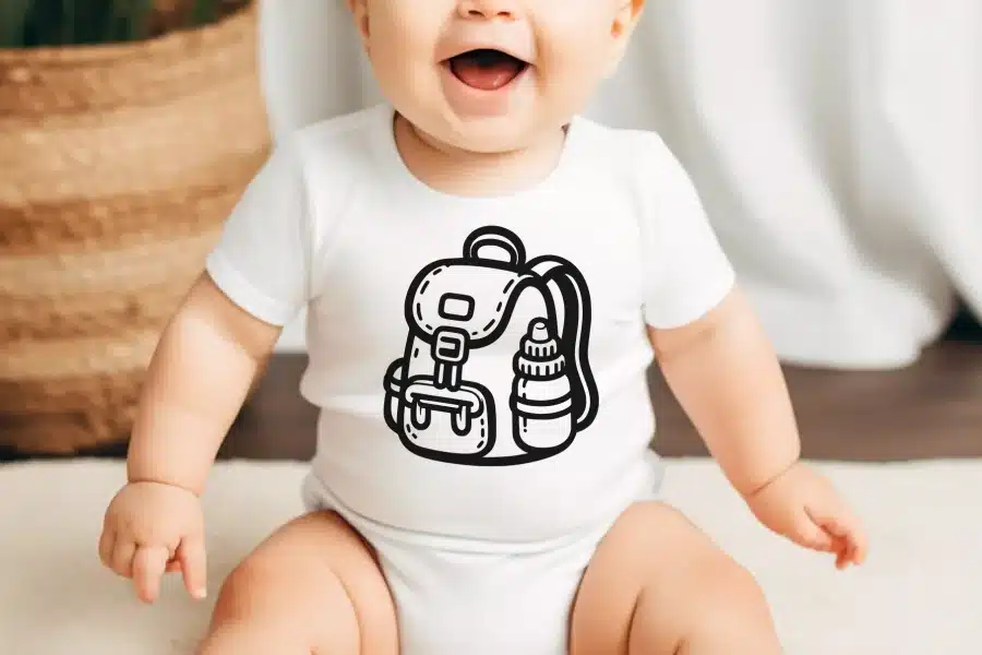 Baby wearing a white onesie with a black line drawing of a backpack and water bottle.