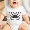 Baby Wearing A White Onesie With A Black Line Drawing Of A Butterfly On The Front.