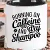 White Coffee Mug With Black Handle And Text That Reads Running On Caffeine And Dry Shampoo.