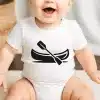 Baby Wearing A White Onesie With A Black Canoe And Paddle Graphic.