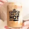 A Person Holding A Glass Of Liquid