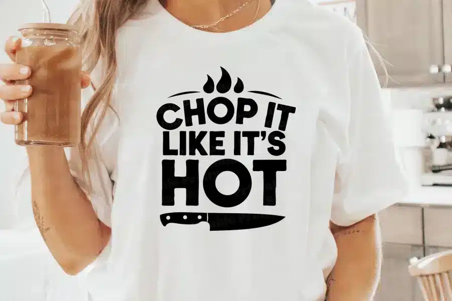 a person wearing a white shirt with black text