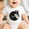 Baby Wearing A White Bodysuit With A Black Fox Design.
