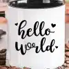 A White Mug With Black Lettering On It