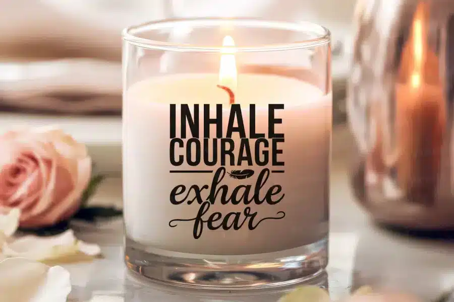 A Candle In A Glass Container