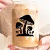 A Person Holding A Glass Of Liquid