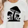 A Woman Wearing A White Shirt With A Black Mushroom Design On It