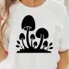 A Person Wearing A White Shirt With Black Mushrooms On It