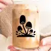 A Person Holding A Glass Of Liquid
