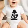 A Baby With A Mushroom Design On It