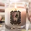 A Candle With A Picture Of A Dog