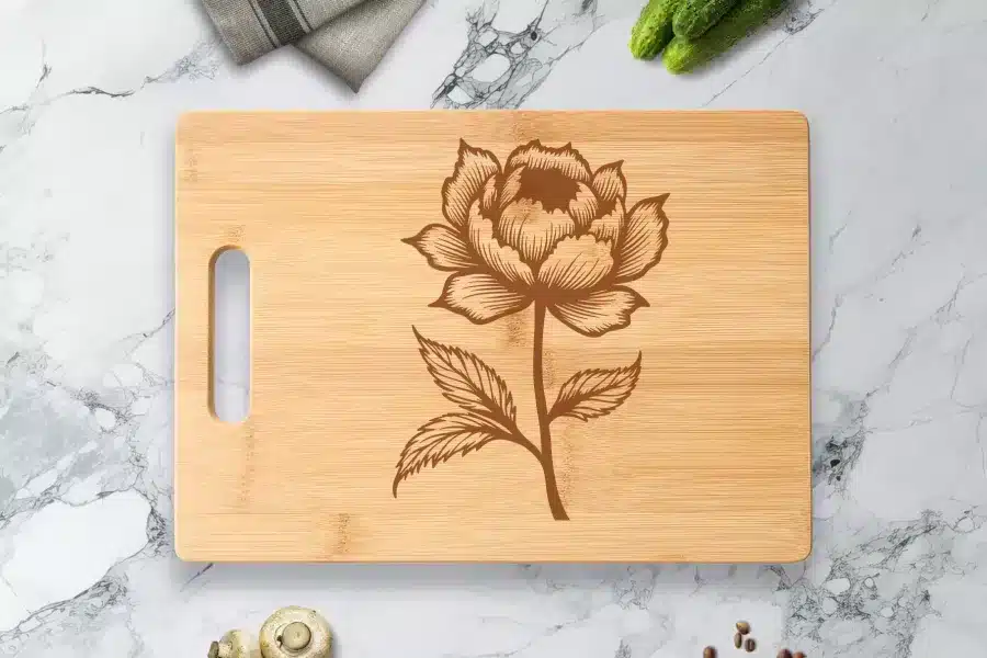 Bamboo Cutting Board With Engraved Floral Design.
