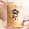 A Person'S Hands Holding A Glass Iced Coffee With A Black Peony Graphic.