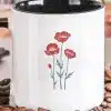 White Coffee Mug With A Black Handle, Featuring A Simple Design Of Three Red Poppies.