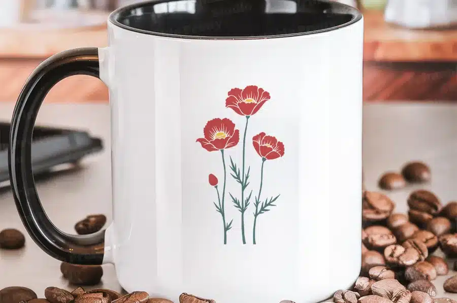 White Coffee Mug With A Black Handle, Featuring A Simple Design Of Three Red Poppies.
