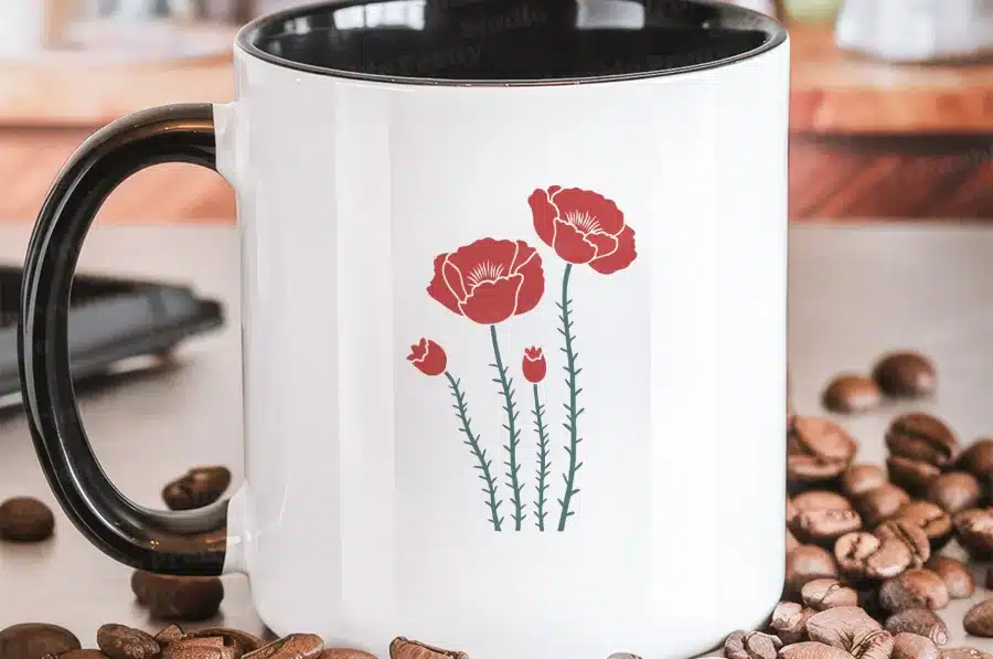 White Coffee Mug With Black Handle, Featuring A Simple Design Of Red Poppies.